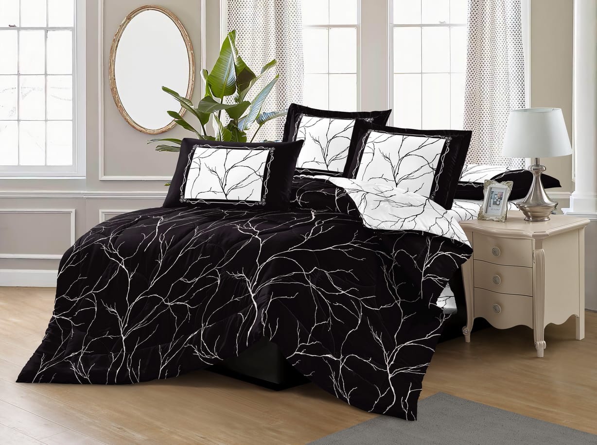 Reversible 3-piece printed quilt set with pillow covers – lightweight, soft, and beautifully designed for year-round comfort.